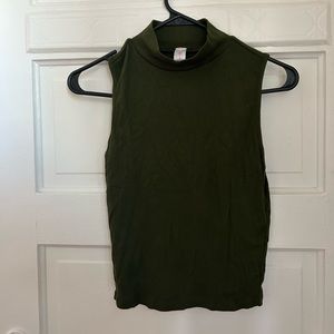 Green turtle neck top